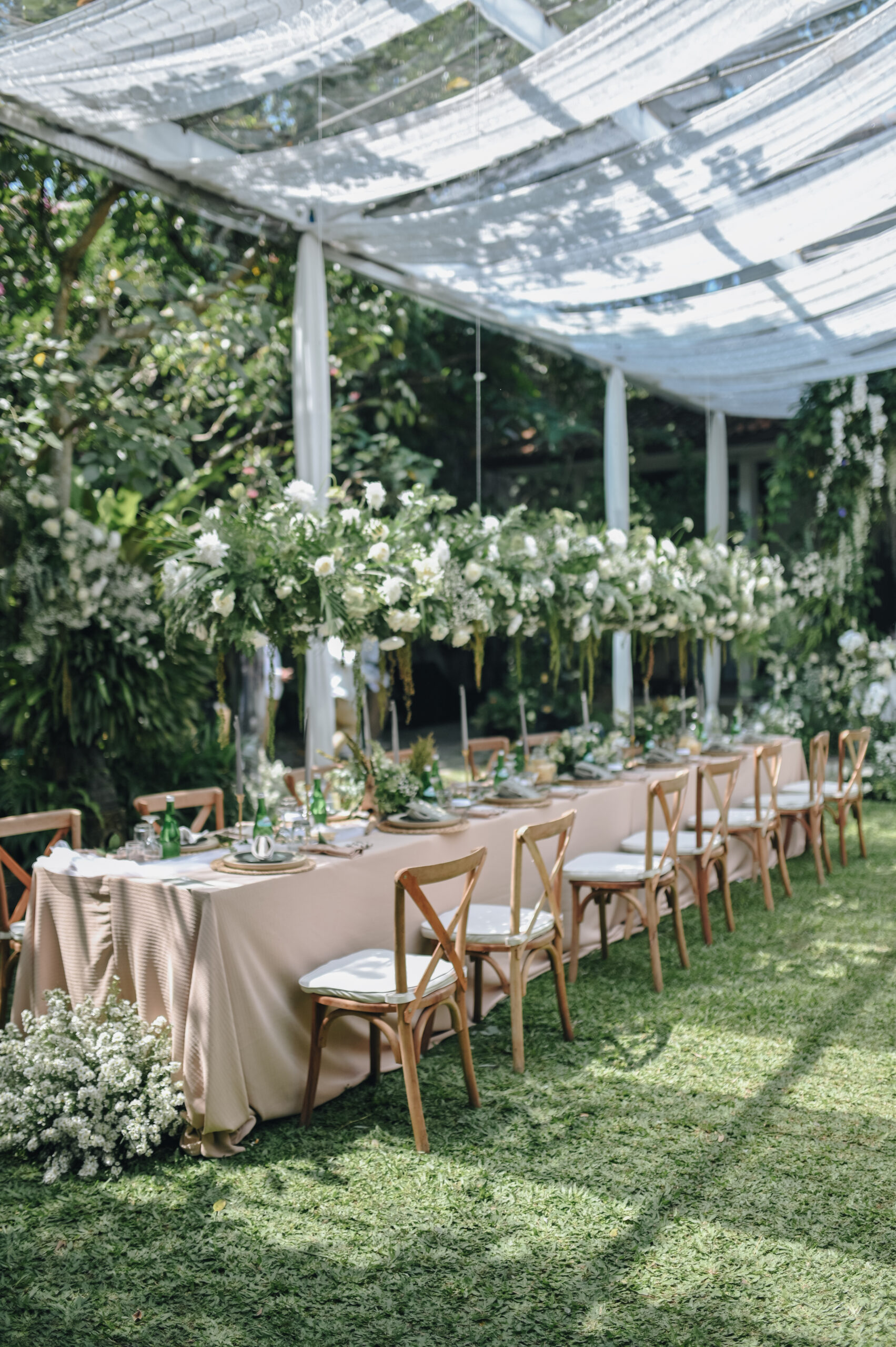Ornamental decorations with multi flora. Outdoors light. Wedding ceremony or wedding decoration with clear tent in the sunny afternoon natural lights.
